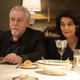 Brian Cox and Hiam Abbass sitting at a dinner table in Succession